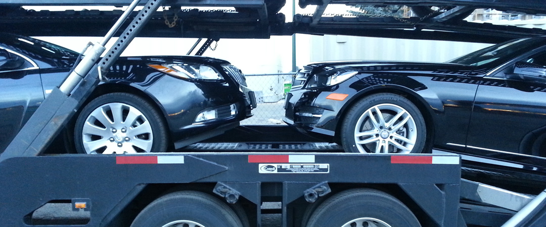 2 sedans meeting in the trailer face to face
